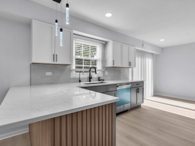 BEAUTIFULLY REMODELED GRAMERCY IN DESIRABLE STRATHMORE on Buffalo Grove Golf Club in Illinois - for sale on GolfHomes.com, golf home, golf lot