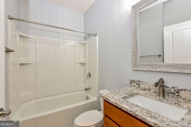 Beautiful home located in resort-style, age-qualified community on Canongate Golf At Sun City Peachtree in Georgia - for sale on GolfHomes.com, golf home, golf lot
