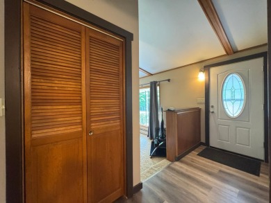 Located in the BRINKLAND neighborhood, this 3BD/2.5BA ranch home on Minocqua Country Club in Wisconsin - for sale on GolfHomes.com, golf home, golf lot
