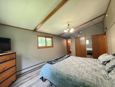 Located in the BRINKLAND neighborhood, this 3BD/2.5BA ranch home on Minocqua Country Club in Wisconsin - for sale on GolfHomes.com, golf home, golf lot