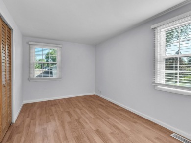 BEAUTIFULLY REMODELED GRAMERCY IN DESIRABLE STRATHMORE on Buffalo Grove Golf Club in Illinois - for sale on GolfHomes.com, golf home, golf lot