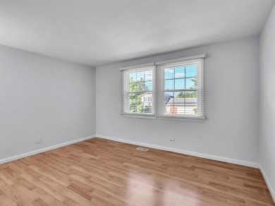 BEAUTIFULLY REMODELED GRAMERCY IN DESIRABLE STRATHMORE on Buffalo Grove Golf Club in Illinois - for sale on GolfHomes.com, golf home, golf lot