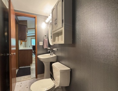 Located in the BRINKLAND neighborhood, this 3BD/2.5BA ranch home on Minocqua Country Club in Wisconsin - for sale on GolfHomes.com, golf home, golf lot
