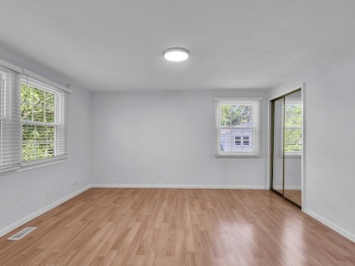 BEAUTIFULLY REMODELED GRAMERCY IN DESIRABLE STRATHMORE on Buffalo Grove Golf Club in Illinois - for sale on GolfHomes.com, golf home, golf lot