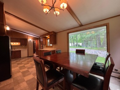 Located in the BRINKLAND neighborhood, this 3BD/2.5BA ranch home on Minocqua Country Club in Wisconsin - for sale on GolfHomes.com, golf home, golf lot
