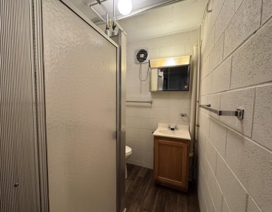 Located in the BRINKLAND neighborhood, this 3BD/2.5BA ranch home on Minocqua Country Club in Wisconsin - for sale on GolfHomes.com, golf home, golf lot