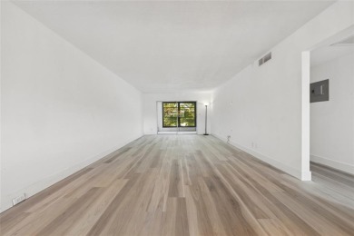 Stunning unit in Wynmoor! Overlooking scenic golf course, this on Wynmoor Golf Course in Florida - for sale on GolfHomes.com, golf home, golf lot
