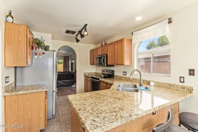 Welcome to this stunning home located in the desirable on Greenfield Lakes Golf Club in Arizona - for sale on GolfHomes.com, golf home, golf lot