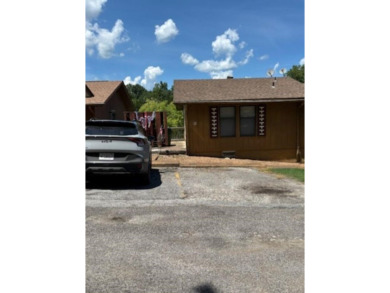 This large 2 bedroom (could be 3) 2 bath townhouse is in the on Cherokee Village North Course in Arkansas - for sale on GolfHomes.com, golf home, golf lot