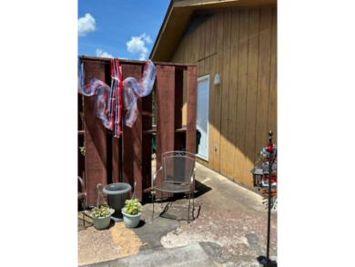 This large 2 bedroom (could be 3) 2 bath townhouse is in the on Cherokee Village North Course in Arkansas - for sale on GolfHomes.com, golf home, golf lot