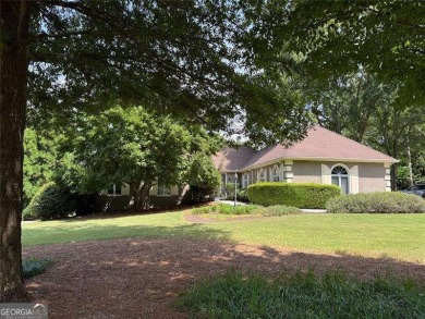 Welcome to 5935 Polo Drive - one of the most affordable homes in on Polo Golf and Country Club in Georgia - for sale on GolfHomes.com, golf home, golf lot