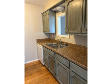 This large 2 bedroom (could be 3) 2 bath townhouse is in the on Cherokee Village North Course in Arkansas - for sale on GolfHomes.com, golf home, golf lot