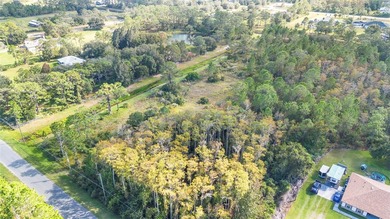 Wedgefield Opportunity! Nearly 5 acres of land--cleared and on Wedgefield Golf Club in Florida - for sale on GolfHomes.com, golf home, golf lot