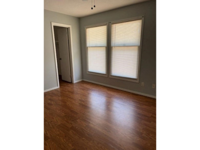 This large 2 bedroom (could be 3) 2 bath townhouse is in the on Cherokee Village North Course in Arkansas - for sale on GolfHomes.com, golf home, golf lot