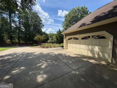 Welcome to 5935 Polo Drive - one of the most affordable homes in on Polo Golf and Country Club in Georgia - for sale on GolfHomes.com, golf home, golf lot