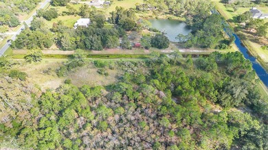 Wedgefield Opportunity! Nearly 5 acres of land--cleared and on Wedgefield Golf Club in Florida - for sale on GolfHomes.com, golf home, golf lot