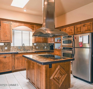 This stunning 2818 square foot residence in the highly desirable on New Mexico St Univ Golf Course in New Mexico - for sale on GolfHomes.com, golf home, golf lot