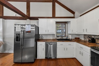 Step inside to discover a warm, inviting interior featuring on The Highlands Course at Lake Arrowhead in Georgia - for sale on GolfHomes.com, golf home, golf lot