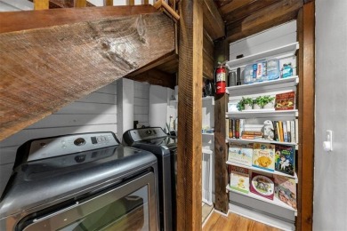 Step inside to discover a warm, inviting interior featuring on The Highlands Course at Lake Arrowhead in Georgia - for sale on GolfHomes.com, golf home, golf lot