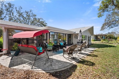 This Single Family home (55+ COMMUNITY) exudes top quality of on Highland Lakes Executive Golf Course in Florida - for sale on GolfHomes.com, golf home, golf lot