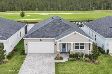 This charming home is situated on a premium homesite in on Cimarrone Golf and Country Club in Florida - for sale on GolfHomes.com, golf home, golf lot