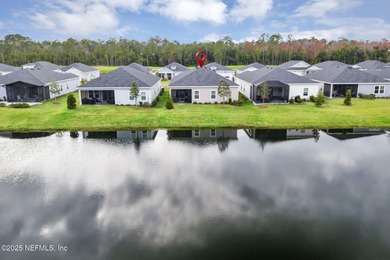 This charming home is situated on a premium homesite in on Cimarrone Golf and Country Club in Florida - for sale on GolfHomes.com, golf home, golf lot