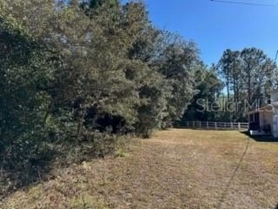 Look no further than the nearly identical lot next door to see on Citrus Springs Country Club in Florida - for sale on GolfHomes.com, golf home, golf lot