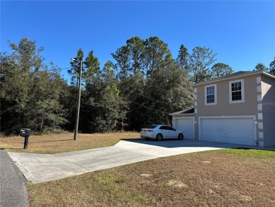 Look no further than the nearly identical lot next door to see on Citrus Springs Country Club in Florida - for sale on GolfHomes.com, golf home, golf lot