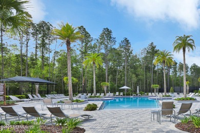 This charming home is situated on a premium homesite in on Cimarrone Golf and Country Club in Florida - for sale on GolfHomes.com, golf home, golf lot