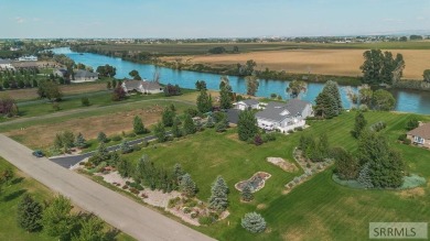 Waterfront!  Nestled along the serene banks of the iconic Snake on Journeys End Golf Course in Idaho - for sale on GolfHomes.com, golf home, golf lot