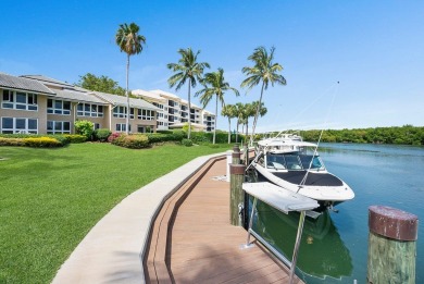 Enjoy picturesque down canal views with this well appointed on Card Sound Golf Club in Florida - for sale on GolfHomes.com, golf home, golf lot