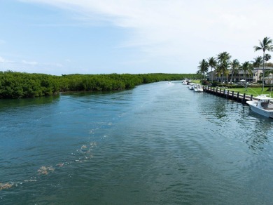 Enjoy picturesque down canal views with this well appointed on Card Sound Golf Club in Florida - for sale on GolfHomes.com, golf home, golf lot