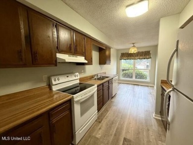 End Unit Townhome on the Golf CourseEnjoy golf course living in on Diamondhead Country Club in Mississippi - for sale on GolfHomes.com, golf home, golf lot