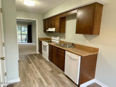 End Unit Townhome on the Golf CourseEnjoy golf course living in on Diamondhead Country Club in Mississippi - for sale on GolfHomes.com, golf home, golf lot