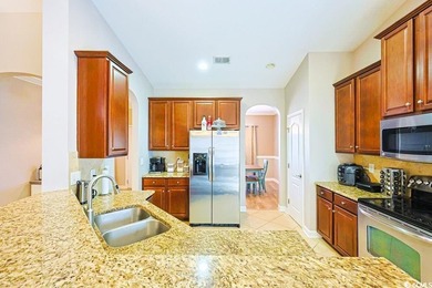 Welcome to this beautifully maintained 3-bedroom, 2-bathroom on Burning Ridge Golf Course in South Carolina - for sale on GolfHomes.com, golf home, golf lot