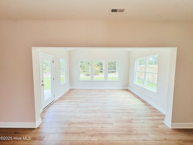 Experience the ease of single-level living in the Somerset III on Green Hills Golf Course in North Carolina - for sale on GolfHomes.com, golf home, golf lot