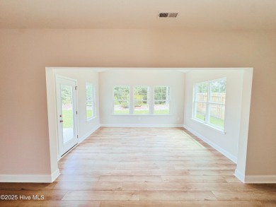 Experience the ease of single-level living in the Somerset III on Green Hills Golf Course in North Carolina - for sale on GolfHomes.com, golf home, golf lot