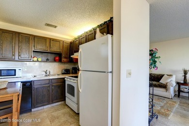 Charming first-floor condo with golf and green space views, plus on  in Florida - for sale on GolfHomes.com, golf home, golf lot