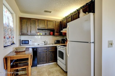 Charming first-floor condo with golf and green space views, plus on  in Florida - for sale on GolfHomes.com, golf home, golf lot