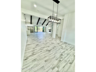 Welcome to Modern Elegance in the Pines! This stunning New on Highland Meadows Golf Club in Arizona - for sale on GolfHomes.com, golf home, golf lot