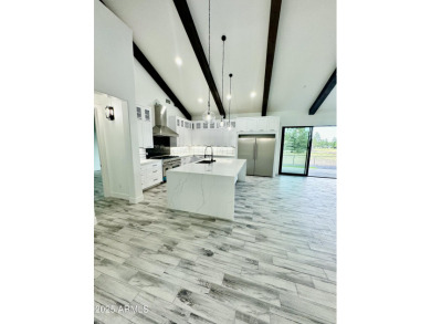 Welcome to Modern Elegance in the Pines! This stunning New on Highland Meadows Golf Club in Arizona - for sale on GolfHomes.com, golf home, golf lot