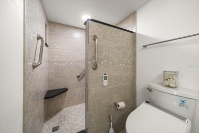 Under contract-accepting backup offers. WATERFRONT LIVING WITH on Isla Del Sol Yacht and Country Club in Florida - for sale on GolfHomes.com, golf home, golf lot