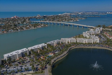 Under contract-accepting backup offers. WATERFRONT LIVING WITH on Isla Del Sol Yacht and Country Club in Florida - for sale on GolfHomes.com, golf home, golf lot