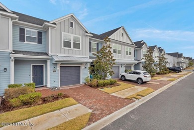 This perfectly maintained, low-maintenance townhome is ready for on Golf Club At South Hampton in Florida - for sale on GolfHomes.com, golf home, golf lot