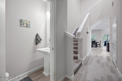 This perfectly maintained, low-maintenance townhome is ready for on Golf Club At South Hampton in Florida - for sale on GolfHomes.com, golf home, golf lot