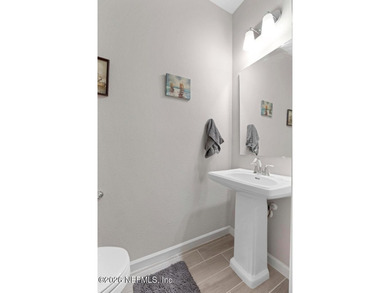 This perfectly maintained, low-maintenance townhome is ready for on Golf Club At South Hampton in Florida - for sale on GolfHomes.com, golf home, golf lot