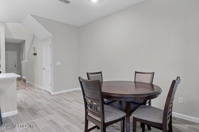 This perfectly maintained, low-maintenance townhome is ready for on Golf Club At South Hampton in Florida - for sale on GolfHomes.com, golf home, golf lot