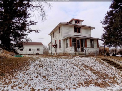 This two~story home is located in a low~traffic area of on Floyd Park Golf Course in Iowa - for sale on GolfHomes.com, golf home, golf lot