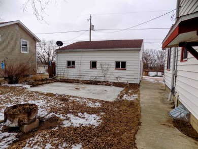 This two~story home is located in a low~traffic area of on Floyd Park Golf Course in Iowa - for sale on GolfHomes.com, golf home, golf lot