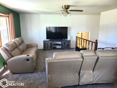 Great 3 bedroom, 1.5 bath split level home with an attached 2 on Linn Grove Country Club in Iowa - for sale on GolfHomes.com, golf home, golf lot